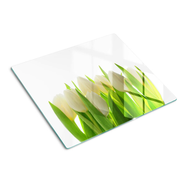 Tábua para cozinha Tulipas em um fundo de folhas verdes