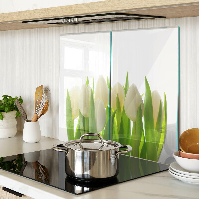 Tábua para cozinha Tulipas em um fundo de folhas verdes