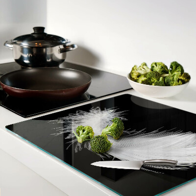 Tábua para corte Pena em fundo preto