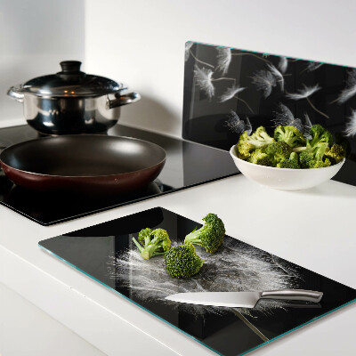 Tábua para corte Dente-de-leão em fundo preto