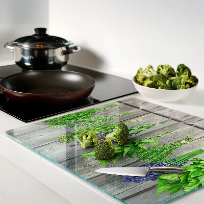 Tábua para cozinha Ervas secas em um fundo de madeira