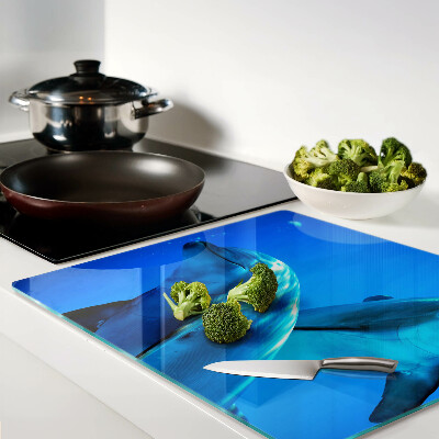 Tábua para corte Golfinhos na água