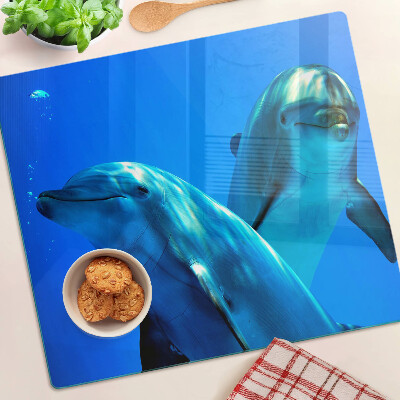 Tábua para corte Golfinhos na água