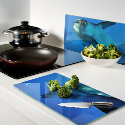 Tábua para corte Golfinhos na água