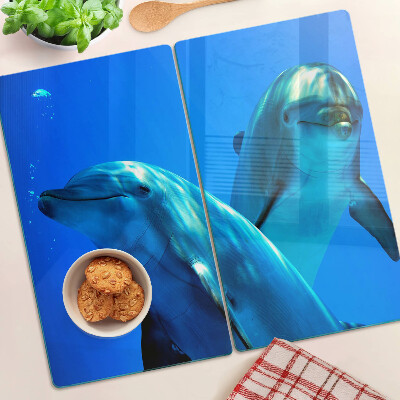 Tábua para corte Golfinhos na água