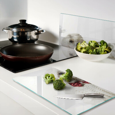 Tábua para cozinha Um cachorro com um suéter e um laço