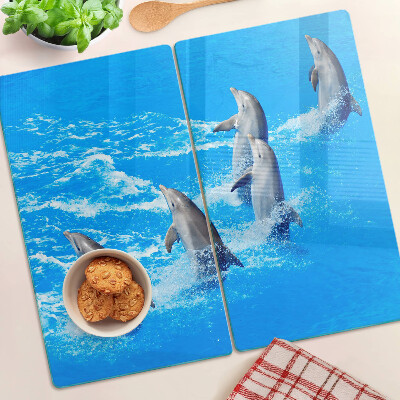 Tábua para corte Golfinhos saltando sobre ondas