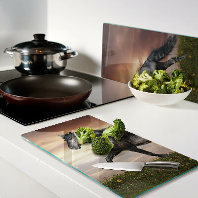 Tábua para corte Um cavalo tendo como pano de fundo o pôr do sol