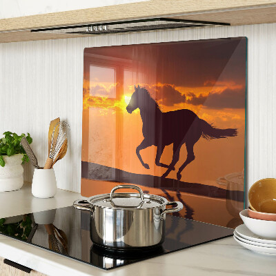 Tábua para cozinha Um cavalo tendo como pano de fundo o pôr do sol