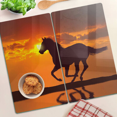 Tábua para cozinha Um cavalo tendo como pano de fundo o pôr do sol