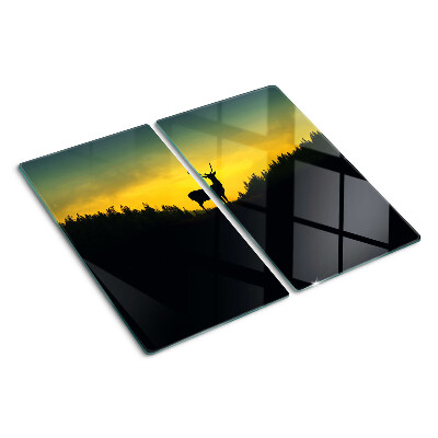 Tábua para corte Veado tendo como pano de fundo o pôr do sol