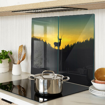 Tábua para corte Veado tendo como pano de fundo o pôr do sol