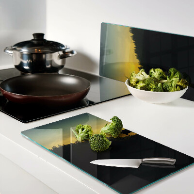 Tábua para corte Veado tendo como pano de fundo o pôr do sol