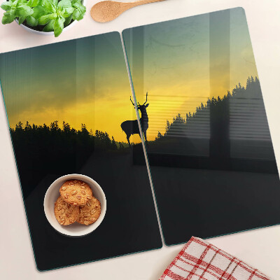 Tábua para corte Veado tendo como pano de fundo o pôr do sol