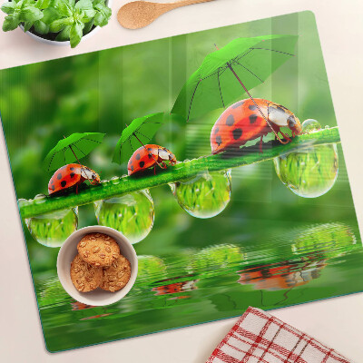 Tábua para cozinha Joaninhas em folhas com gotas de água