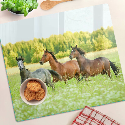 Tábua para cozinha Um encontro de cavalos no campo