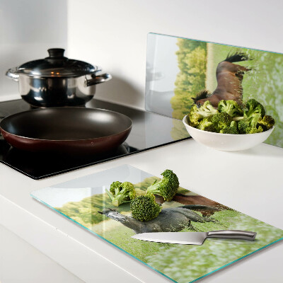 Tábua para cozinha Um encontro de cavalos no campo