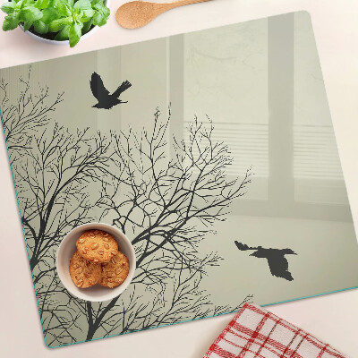 Tábua para corte Pássaros nos galhos das árvores