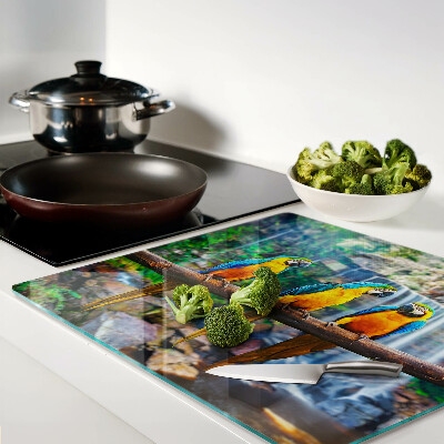 Tábua para cozinha Papagaios em um galho em uma floresta tropical