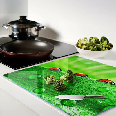 Tábua para cozinha Joaninhas em um fundo verde