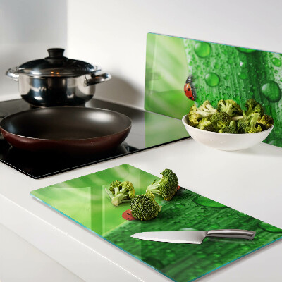 Tábua para cozinha Joaninhas em um fundo verde