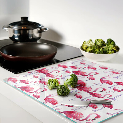 Tábua para corte Flamingos em um fundo branco