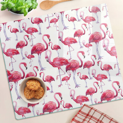 Tábua para corte Flamingos em um fundo branco