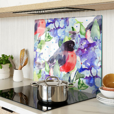 Tábua para corte Um pássaro contra um fundo de flores