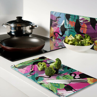 Tábua para cozinha Flamingos em um fundo colorido