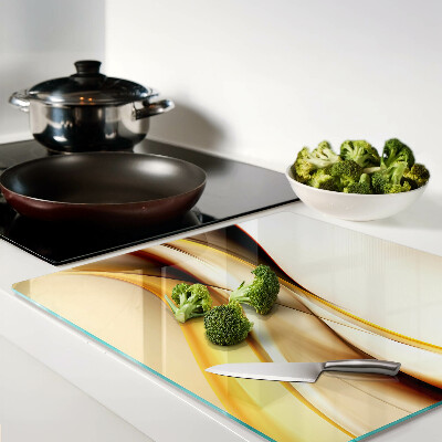 Tábua para corte Ondas abstratas em tons de dourado