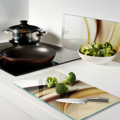 Tábua para corte Ondas abstratas em tons de dourado