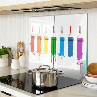 Tábua para corte Um arco-íris de tintas em pincéis