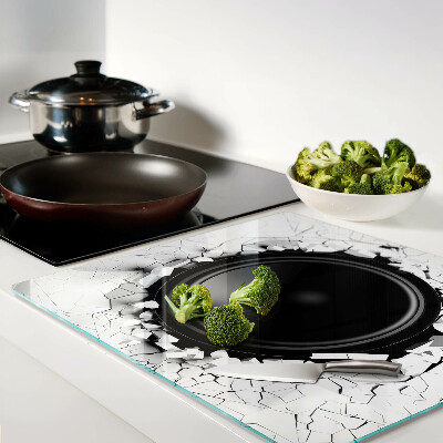 Tábua para corte Alto-falante em uma parede quebrada