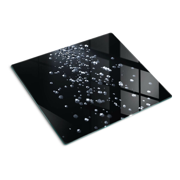 Tábua para corte Bolhas de cristal em um fundo preto