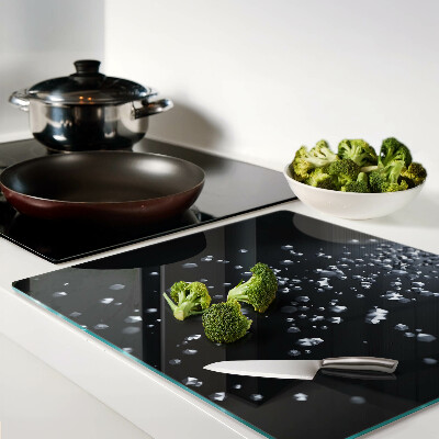 Tábua para corte Bolhas de cristal em um fundo preto