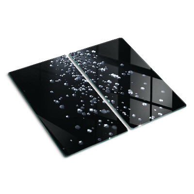 Tábua para corte Bolhas de cristal em um fundo preto