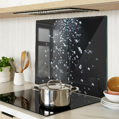 Tábua para corte Bolhas de cristal em um fundo preto