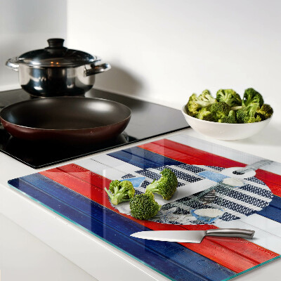 Tábua para cozinha Âncora contra o fundo de listras