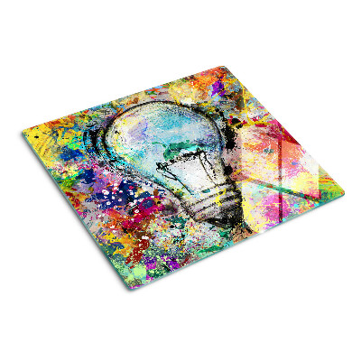 Tábua para corte Lâmpada em um fundo colorido