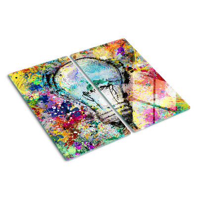 Tábua para corte Lâmpada em um fundo colorido