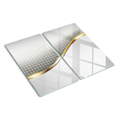 Tábua para corte Uma onda dourada sobre um fundo de pontos