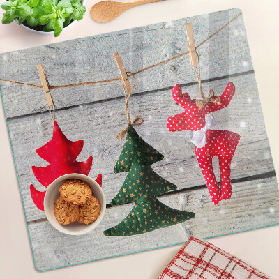 Tábua para cozinha Decorações de Natal em um fundo de madeira