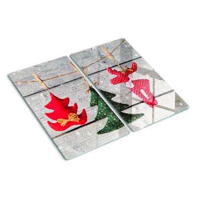 Tábua para cozinha Decorações de Natal em um fundo de madeira