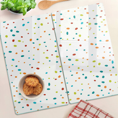 Tábua para corte Pontos coloridos em um fundo branco