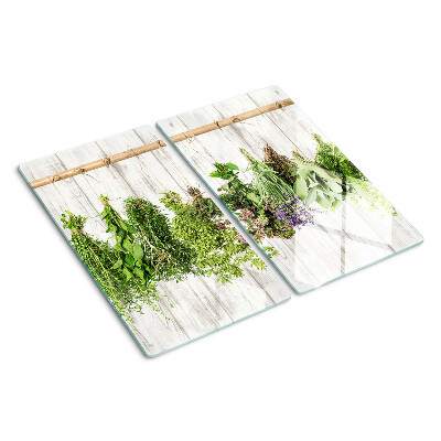 Tábua para corte Ervas em um fundo de madeira