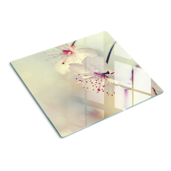 Tábua para corte Flores em um fundo geométrico