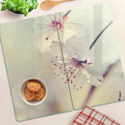 Tábua para corte Flores em um fundo geométrico