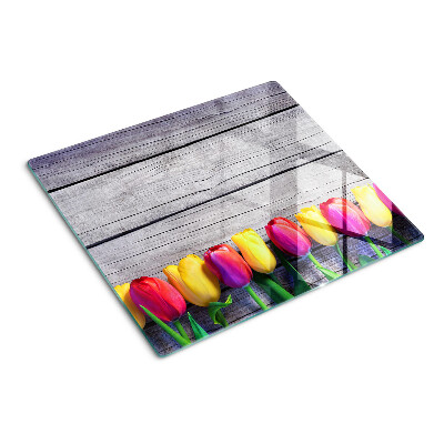 Tábua para cozinha Tulipas em um fundo de madeira