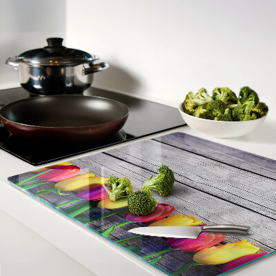 Tábua para cozinha Tulipas em um fundo de madeira