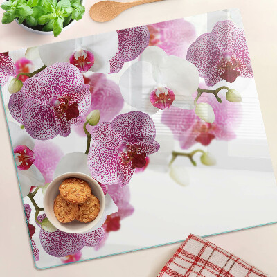 Tábua para corte Orquídeas ao fundo da janela